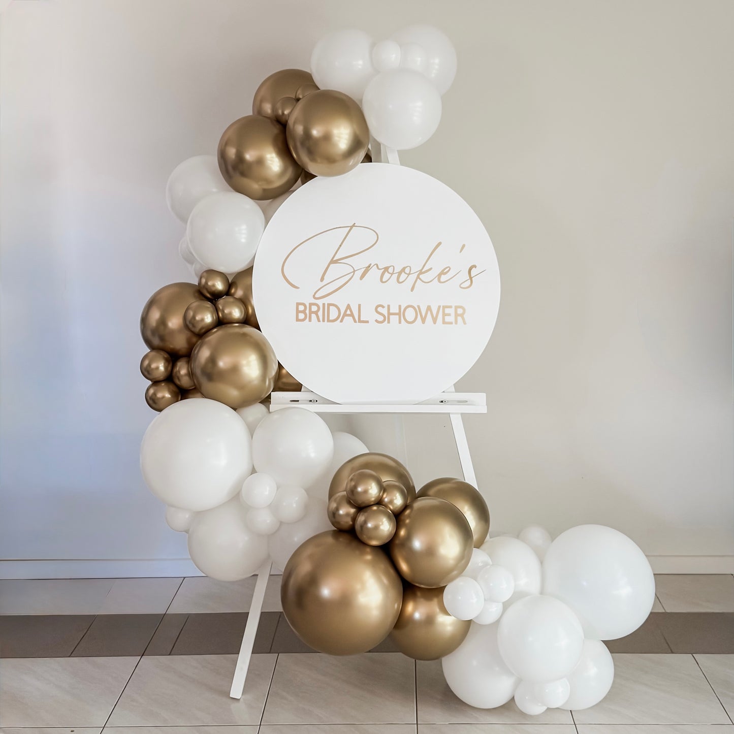 1.7m White Easel with 70cm Round Disc & 2m Garland - HIRE ONLY